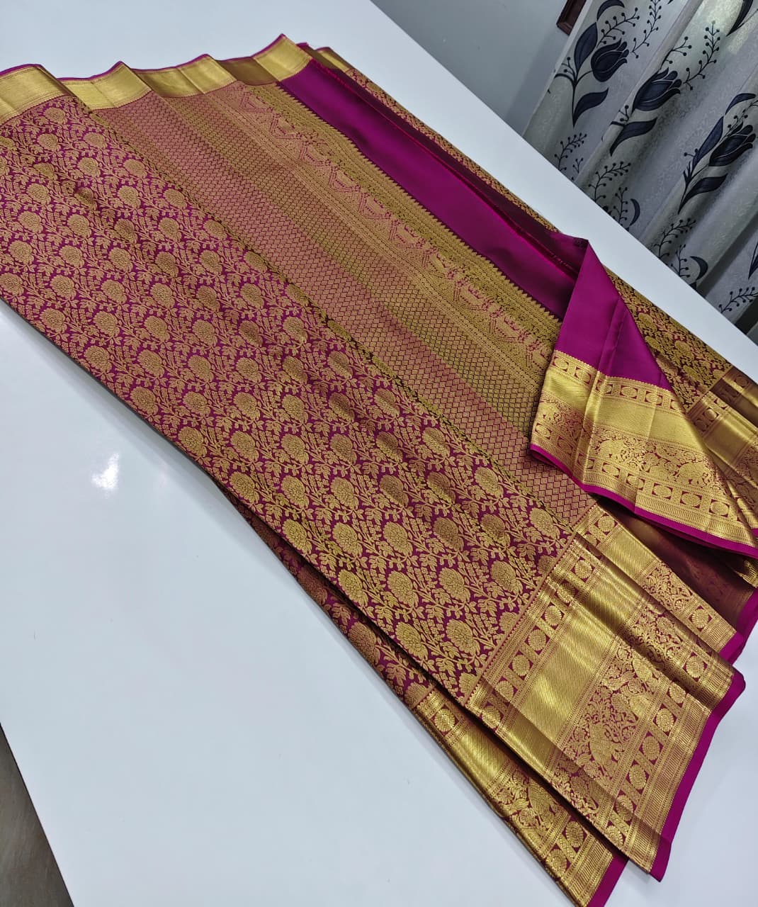 Rani Pink Kanjivaram Silk Saree with a Broad Golden Zari Border